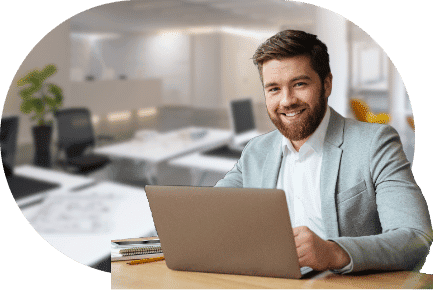 Man dressed in a suit working at a moving company office.