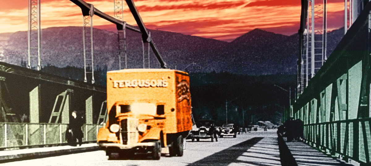 Historic image of a Ferguson moving truck crossing the Lions Gate Bridge in Vancouver.