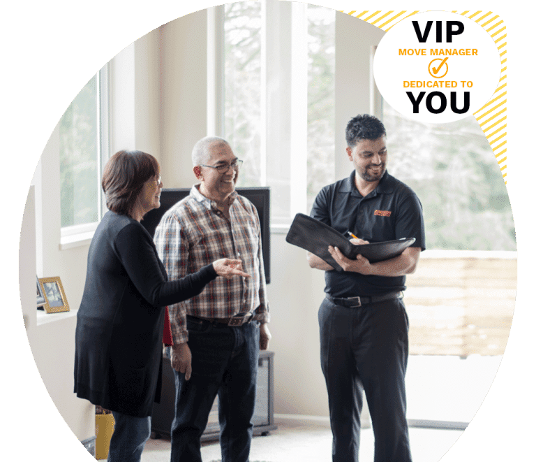 Ferguson move manager discussing upcoming relocation plans with clients.