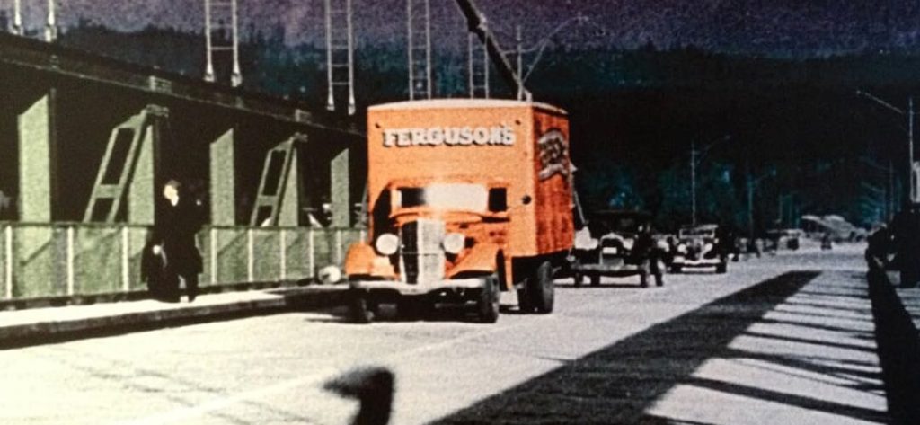 Historic Ferguson Moving & Storage truck crossing Vancouver’s Lions Gate Bridge.